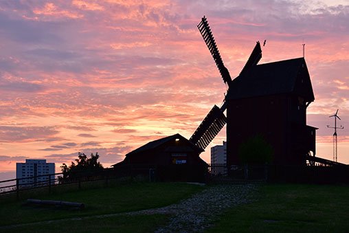 Silhouette of a windmill against a beautiful sky.