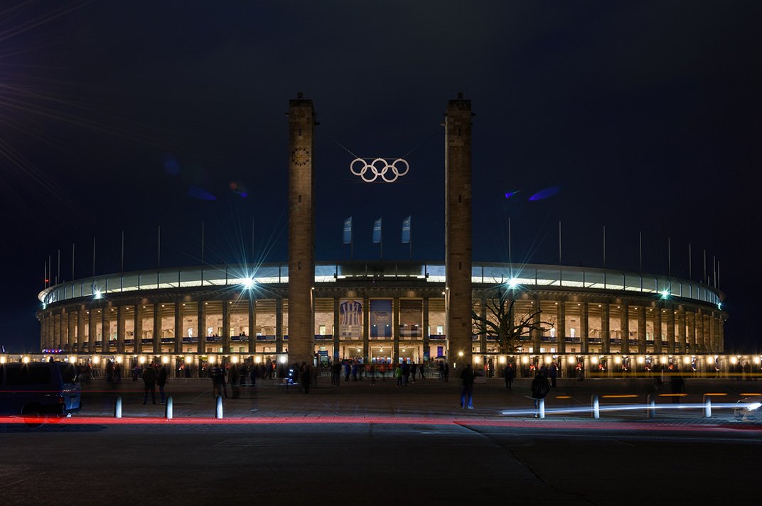 The Olympic Stadium during a Hertha BSC evening game."