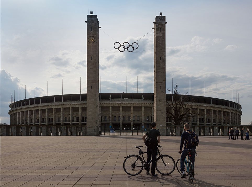 Cyclists take a break to look at Berlin