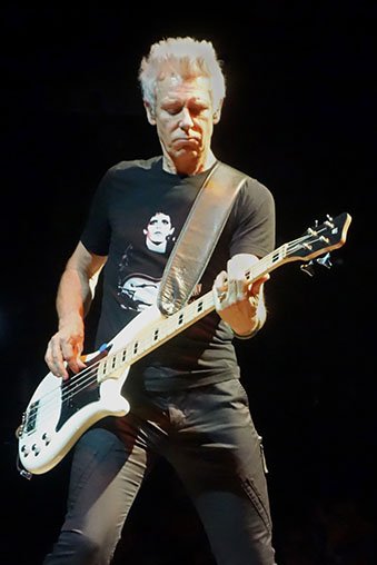 Adam Clayton on stage in Berlin.