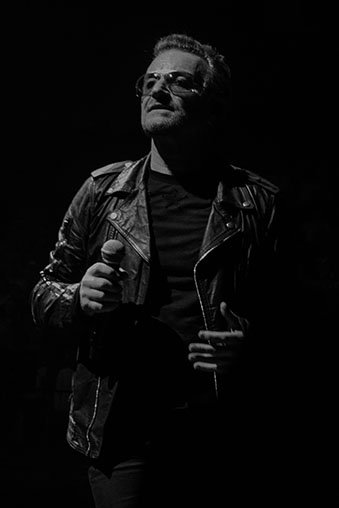 A black and white shot of Bono.