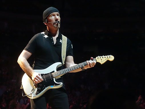 The Edge on stage in Berlin.